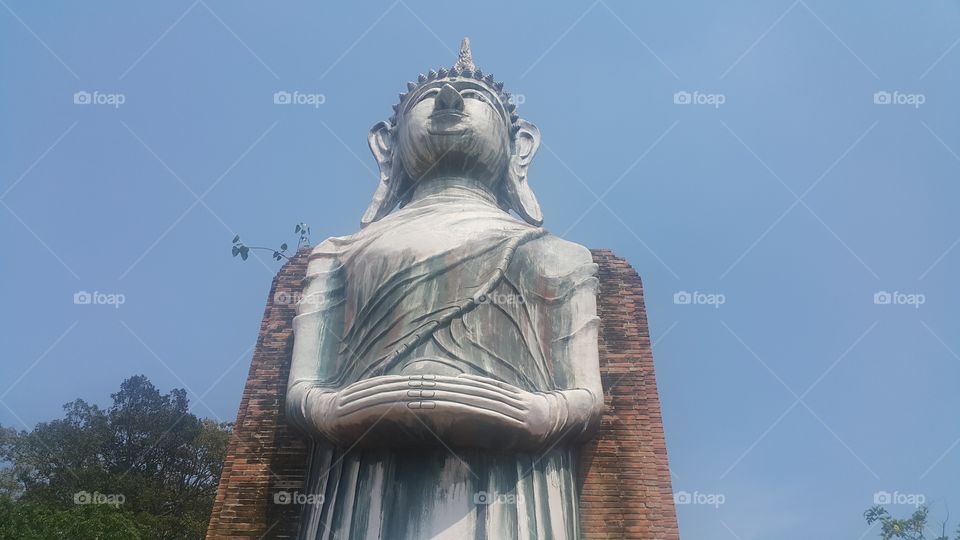 Antique buddha statue in thailand.