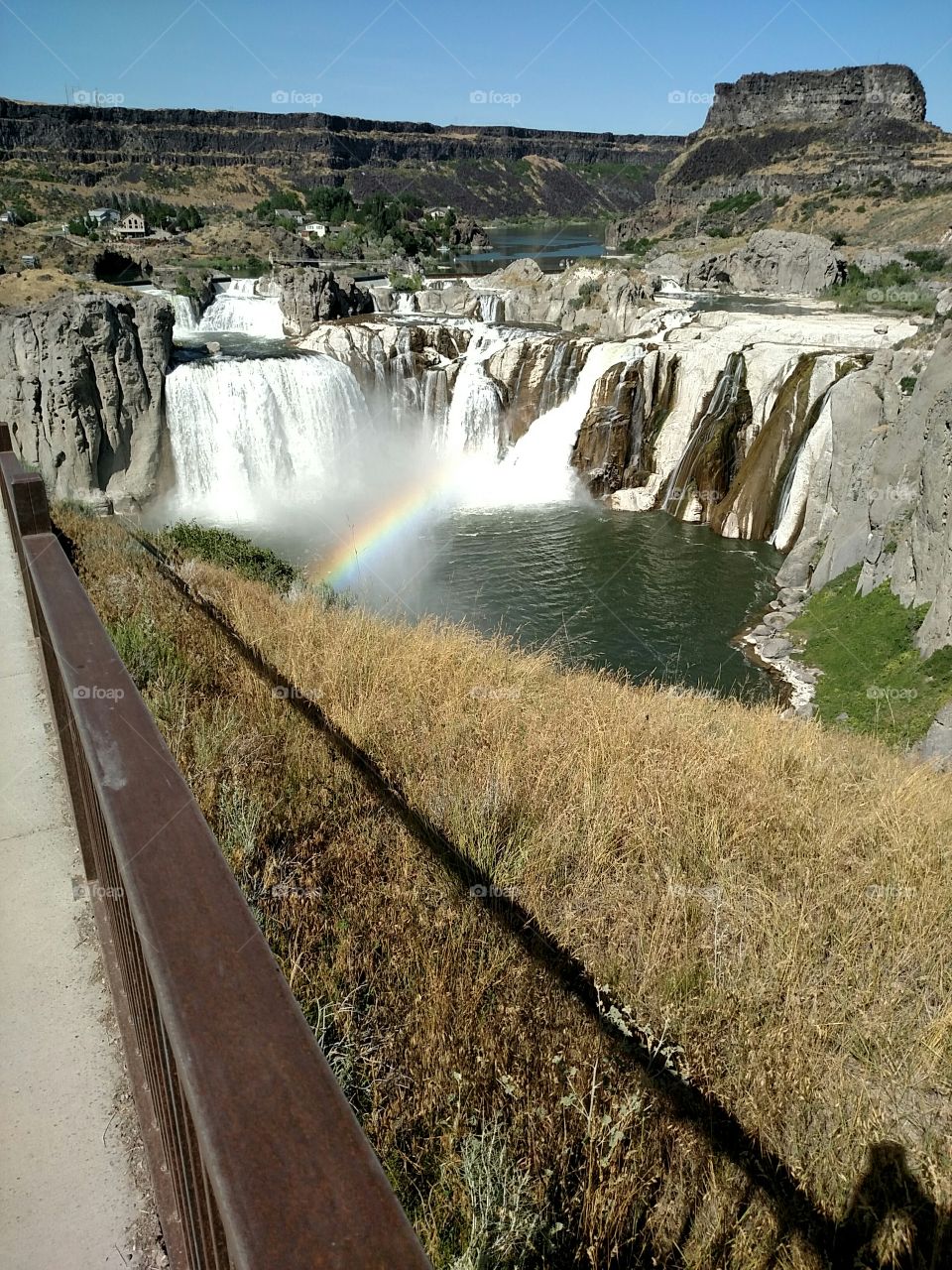 Summer day and a rainbow at Shoshone Falls