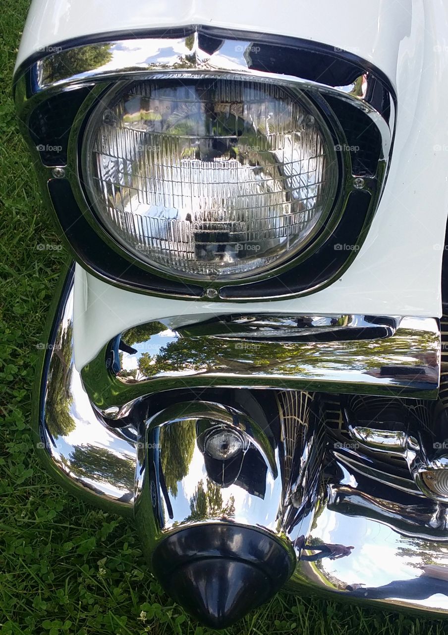 1957 White Chevrolet Bel Air headlight front bumper