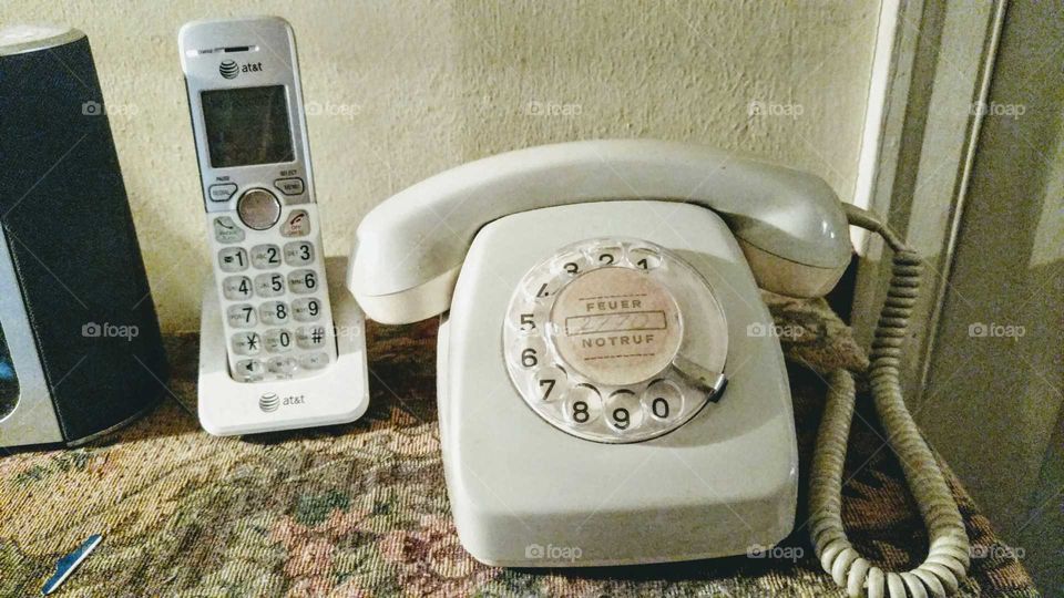 The old meets with the new. Who can remember the rotary phone? This rotary phone was found in a thrift store. Much has changed in the world of technology. From simple communication to a load of information, the phone has gone through a world of change for the better.