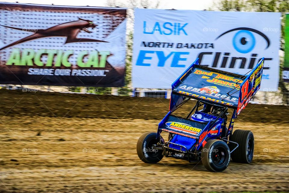 Action Photo of Mark Dobmeier Outlaw Sprint Car auto racing at The World Famous Legendary Bullring River Cities Speedway in Grand Forks North Dakota 