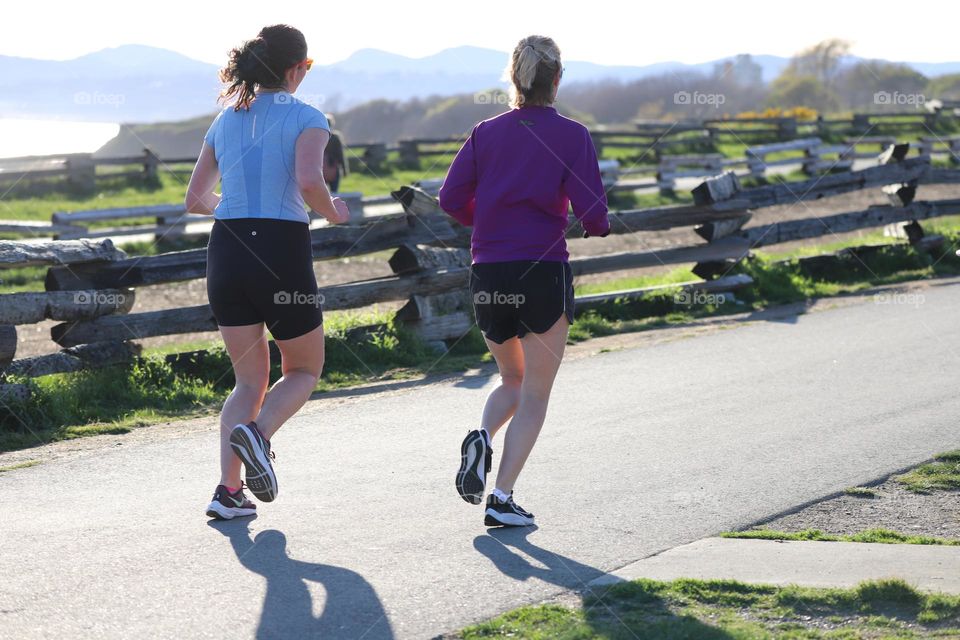 Women running on a sunny day