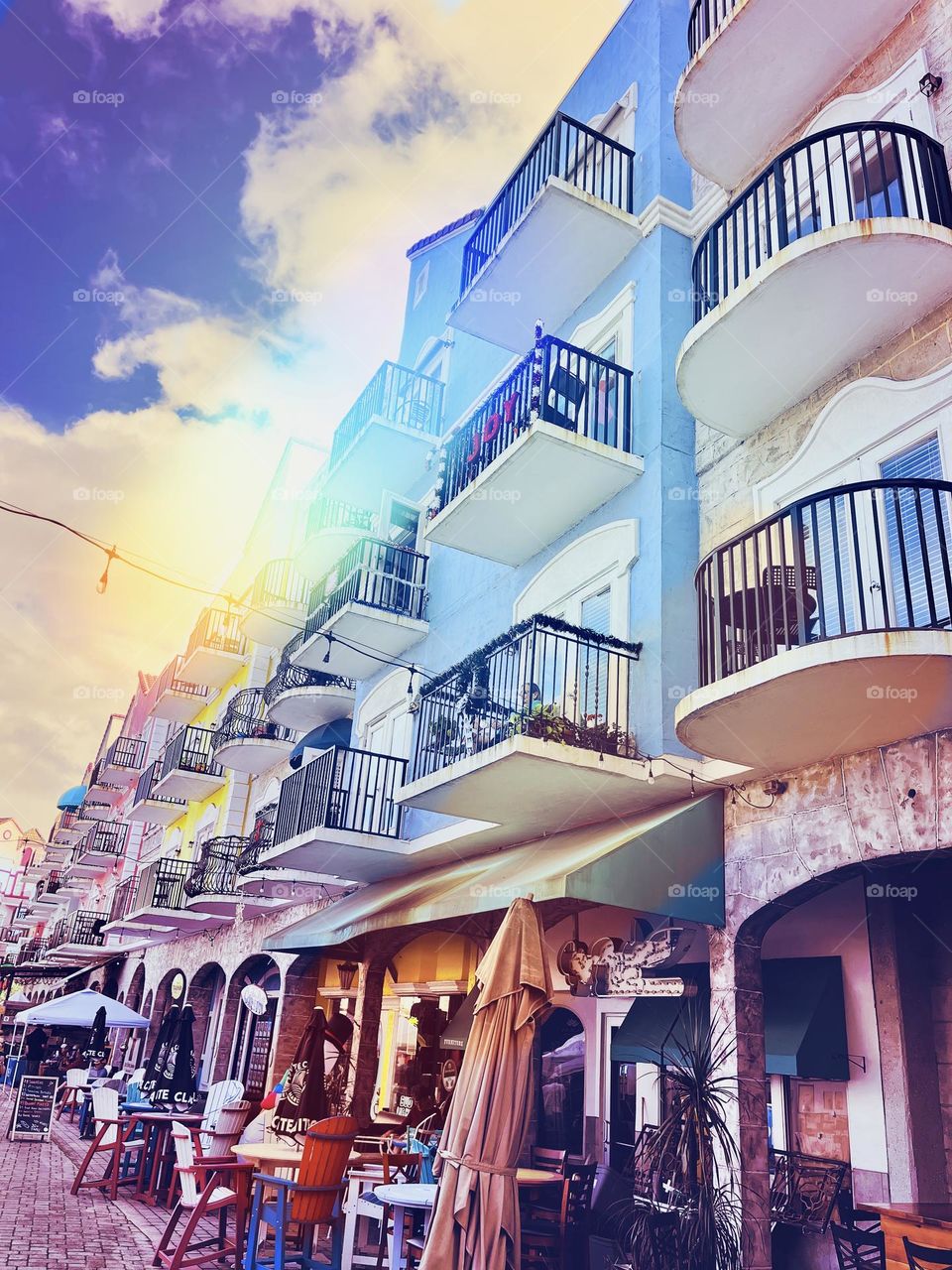 Blue European houses with black parapets