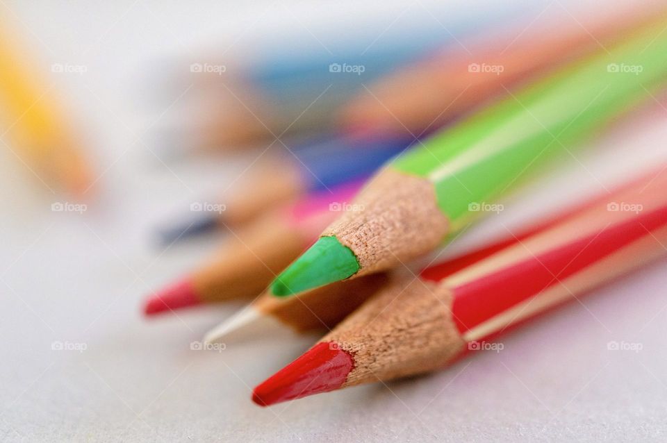 Colored pencils, focus on the red and green pencil