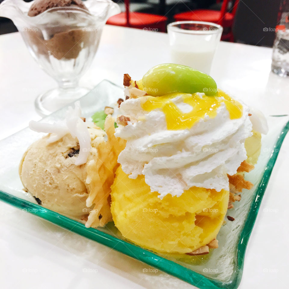 Summertime Ice Cream : Mango ice creams with green sticky rice, almond and fresh young coconut.