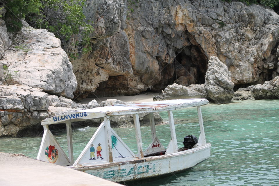 Haiti boat and cave