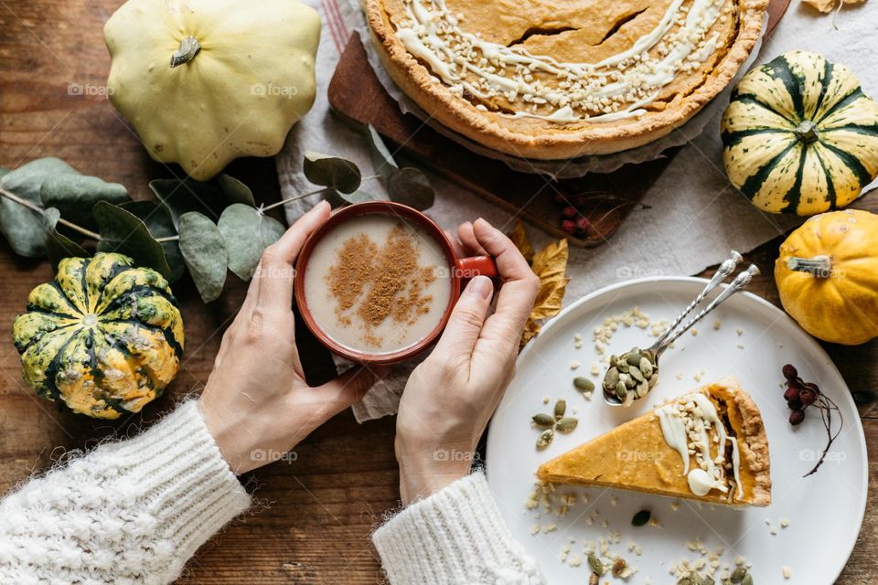 Pumpkin spice latte and pumpkin pie. Fall foods.