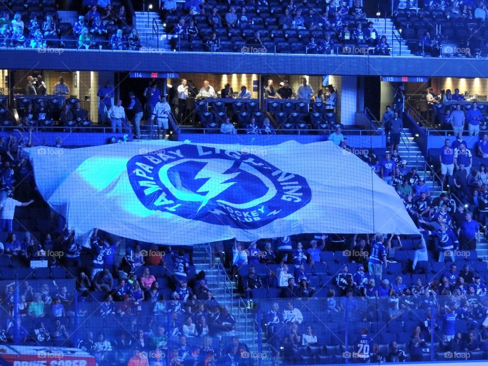 Tampa Bay Lightning fans prepare for their team to take the ice at the Amalie Arena in Tampa, Florida.