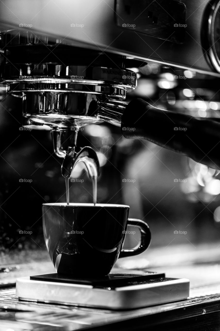 Making a coffee in a cafe