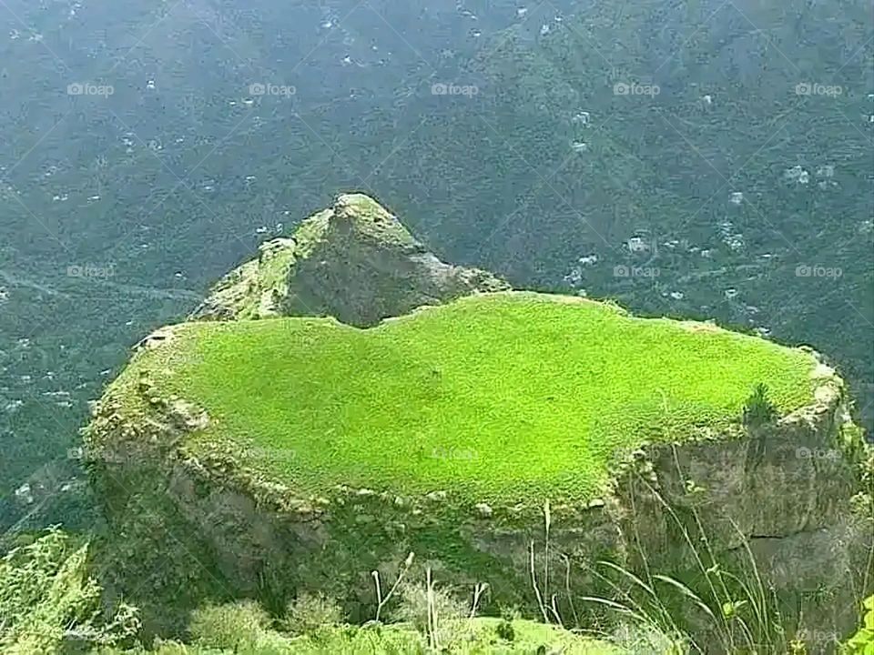 Glory be to God, the magnificent and picturesque view and the natural green trees are a view that is nothing more wonderful than it