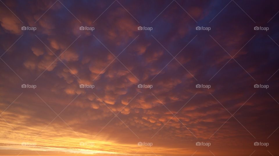 Beautiful clouds Sunset pic at perfect Time. Complete Natural Art.