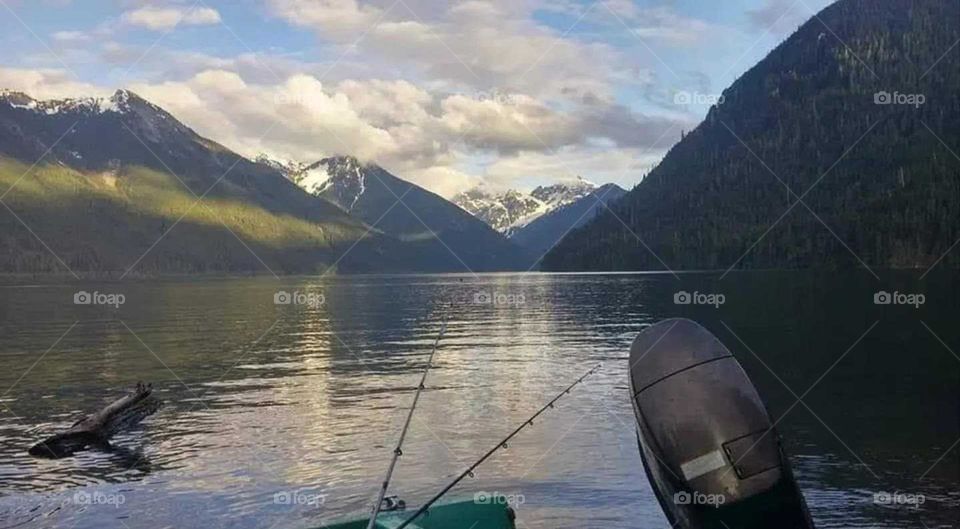 Peaceful view of the lake and mountains from the boat.