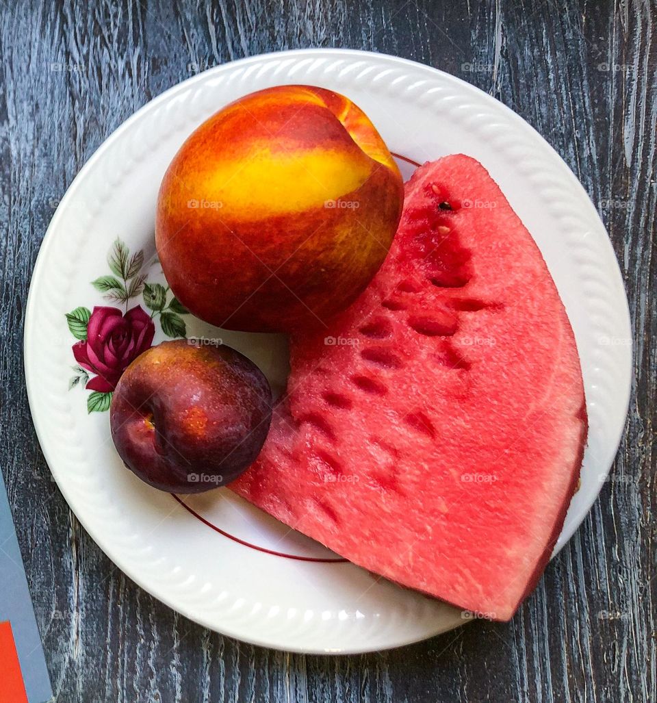 Watermelon, nectarine, plum for breakfast 