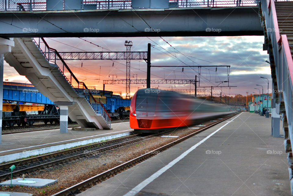 A train shot showing its speed..... The photo shows nice and beautiful composition of the train going by.