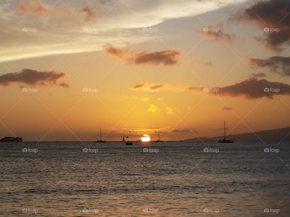 Sun sets over Waikiki Beach