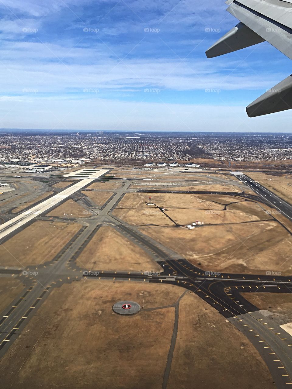 Takeoff - starting our vacation leaving JFK Airport in NY.  Looking down on runways below is. 