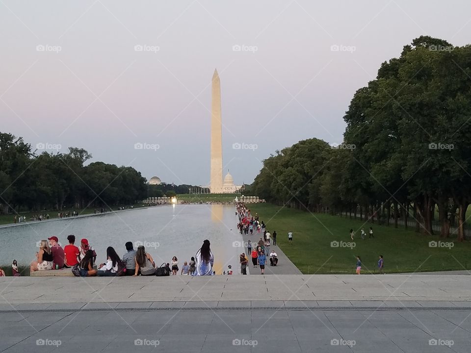 Washington DC monument, reflecting pool, Lincoln's stairs, and the Whitehouse far back right of monument