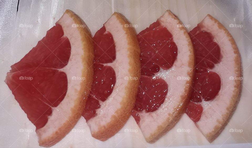 Grapefruit on white background