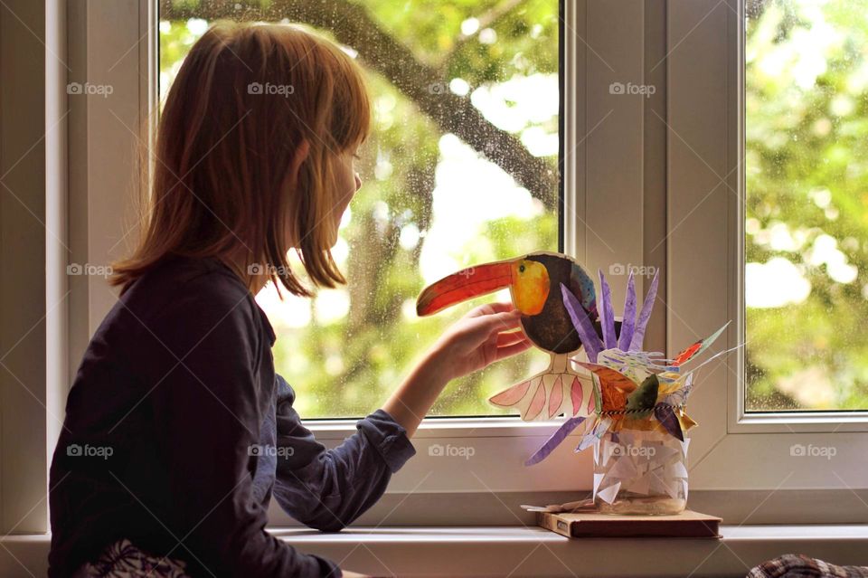 Girl near the window