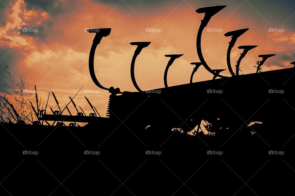 Silhouette Of Farm Equipment, Sunset On The Farm, Sunset In The Fields, Farming Equipment Backlit By The Sunshine, Silhouette In The Country, Farm Portrait 