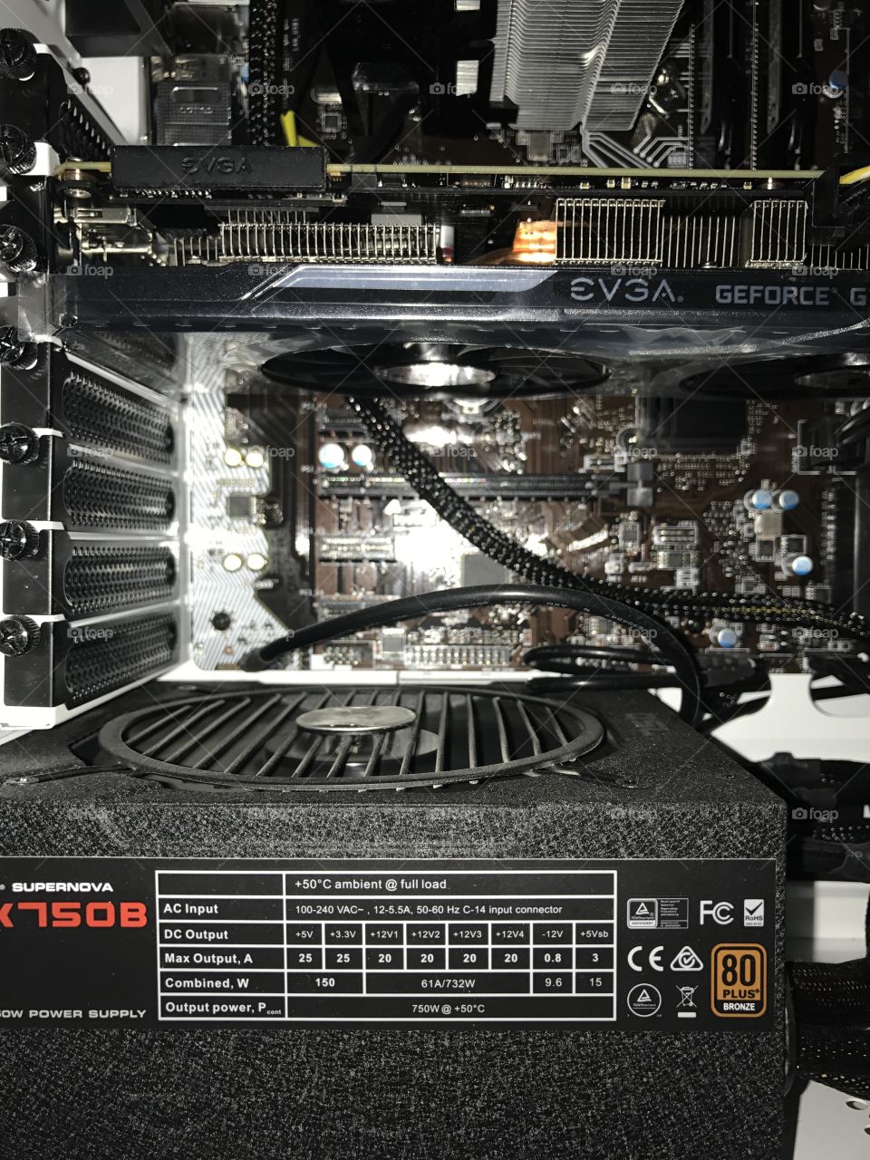 Motherboard and power unit with fan