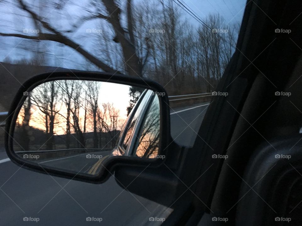 Beauty in the rear view mirror, gorgeous sunset, reflections 