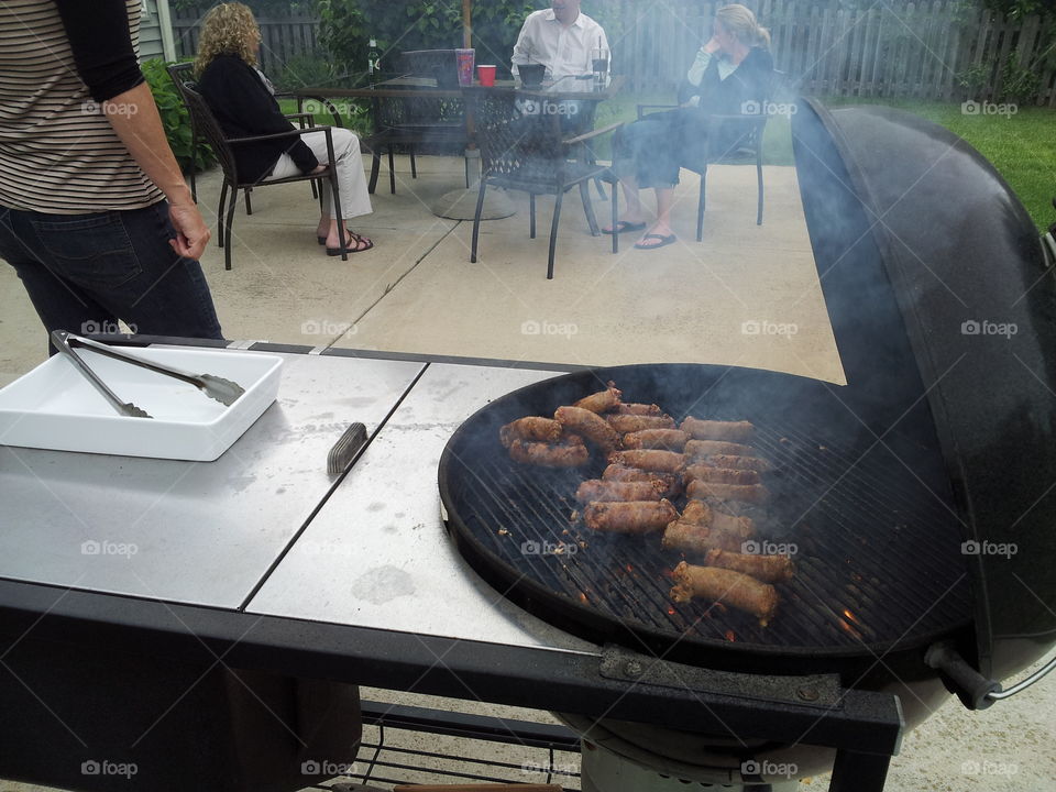 BBQ grilling on the patio with family and friends