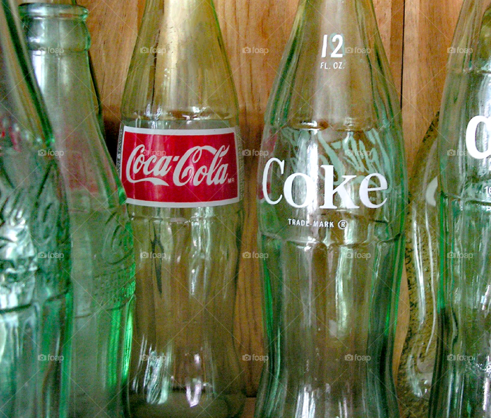 Coke-Cola bottles one red label