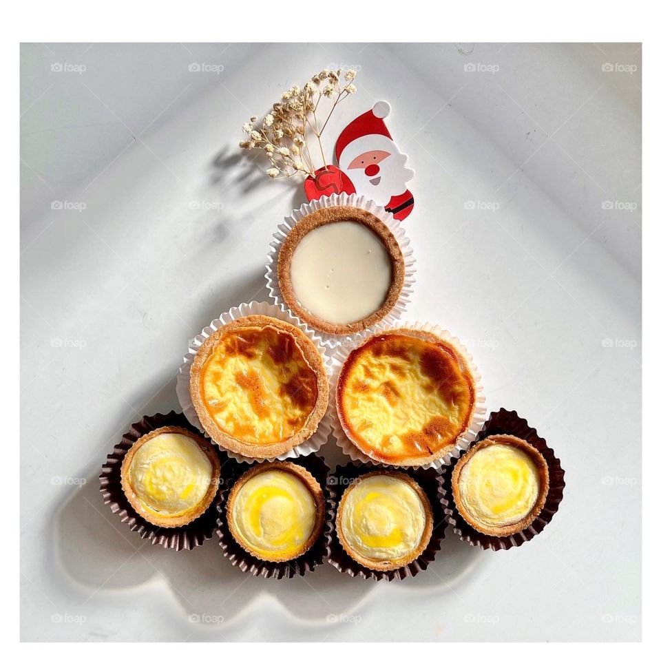 Homemade yummy egg tarts , beancurd tarts  and cheese tarts for Christmas 
