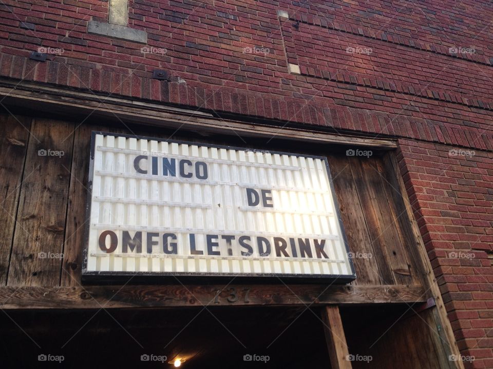 Cinco de omfg letsgetdrunk. The bottlekneck' sign on cinco de mayo, lawrence ks