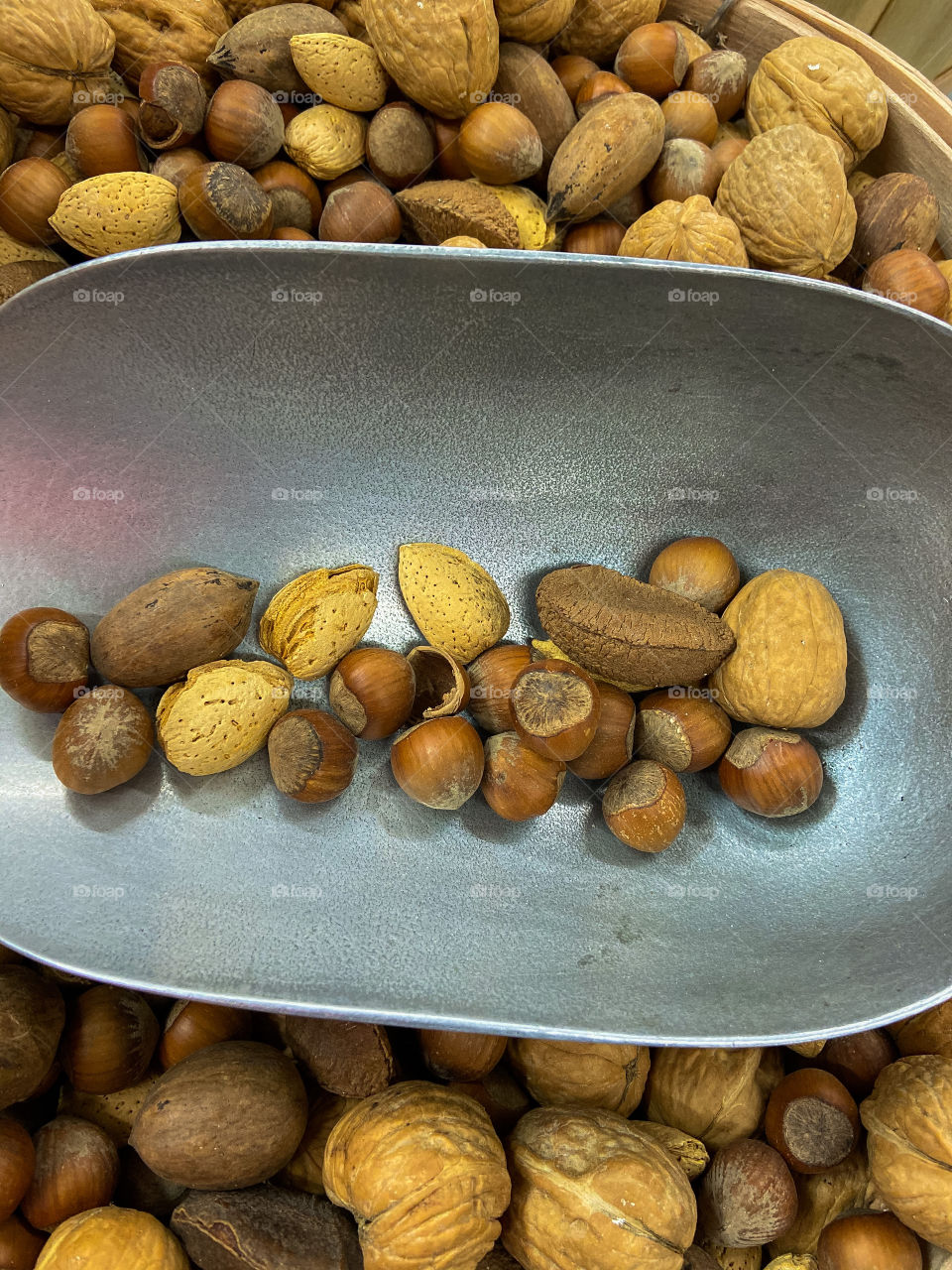 Nuts in a metal shovel