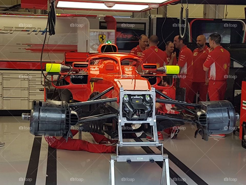 Ferrari team work f1 garage