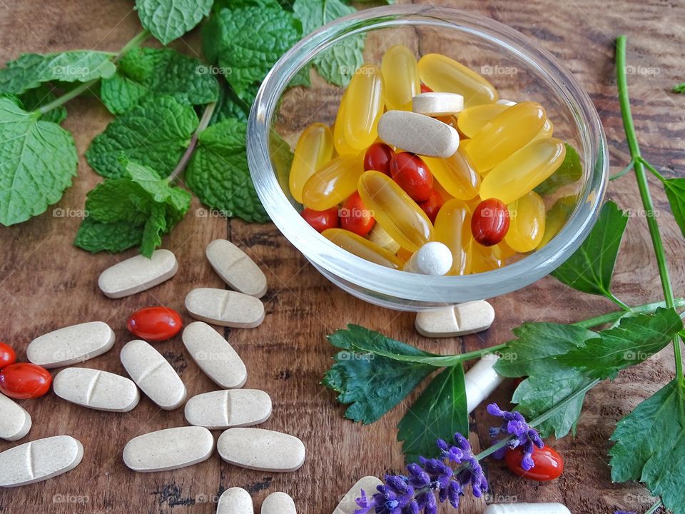 Bowl with pills for a healthy lifestyle