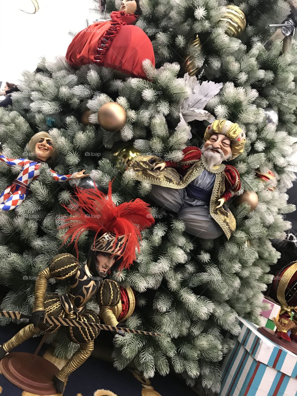 Dolls in Christmas trees. Christmas Eve.