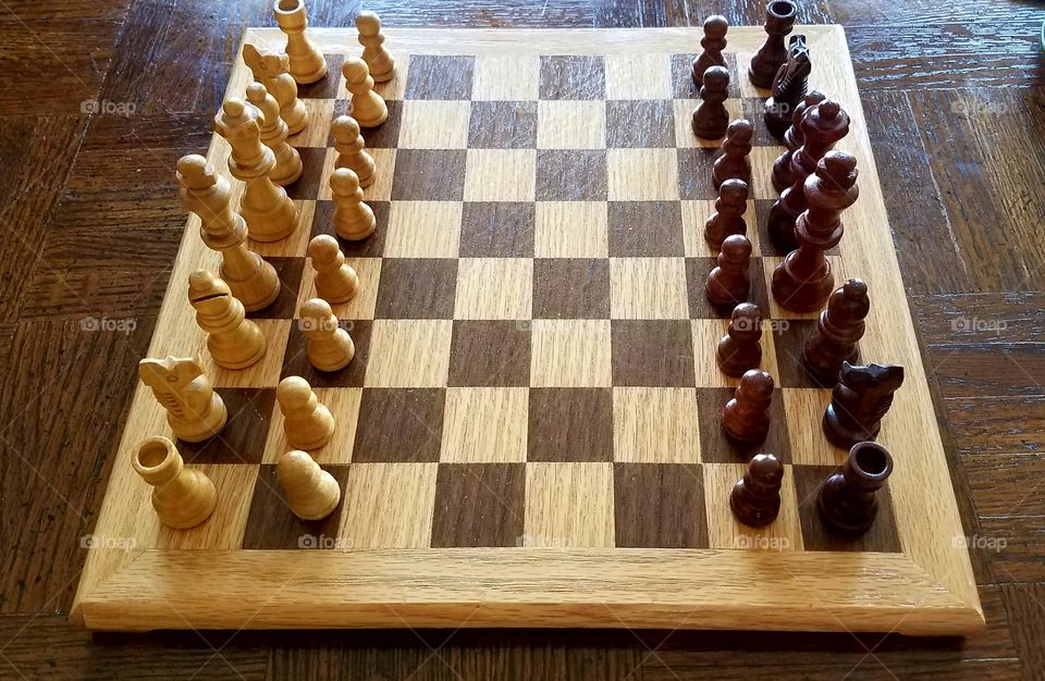 wood chess game on wood table