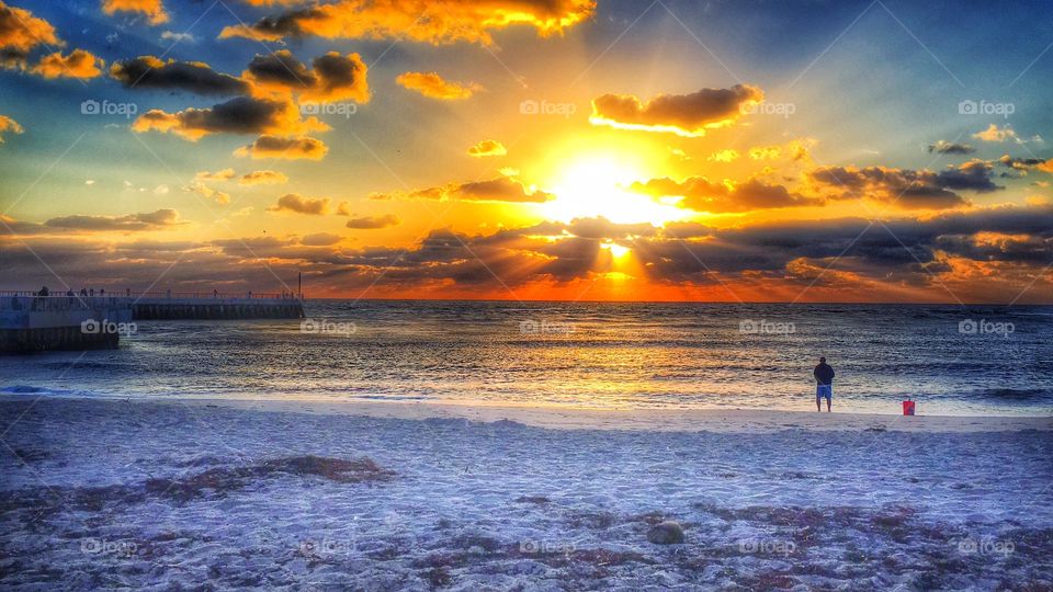 Scenic view of a sea at the time of sunset