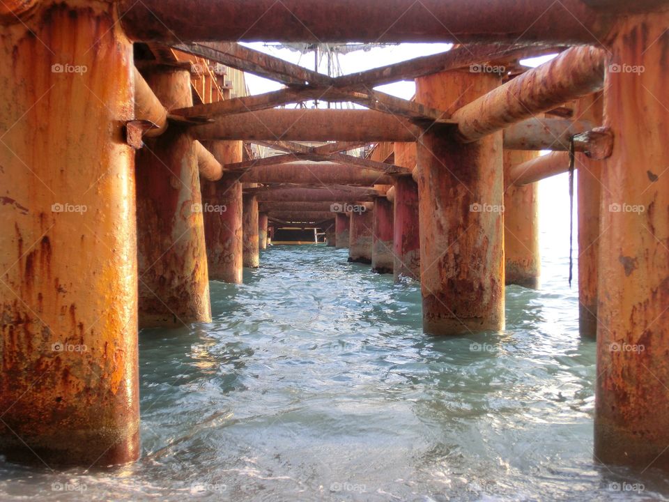 Rusty metal structures of the pier