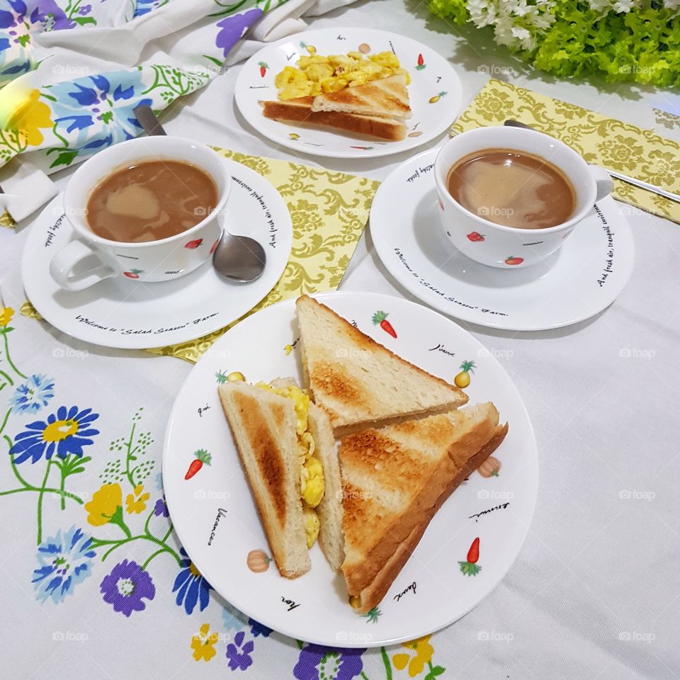 breakfast with toast egg and coffee