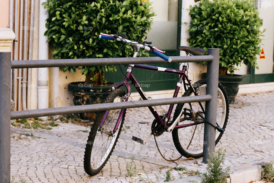 One lonely bicycle on historical city, Lisbon, Portugal 