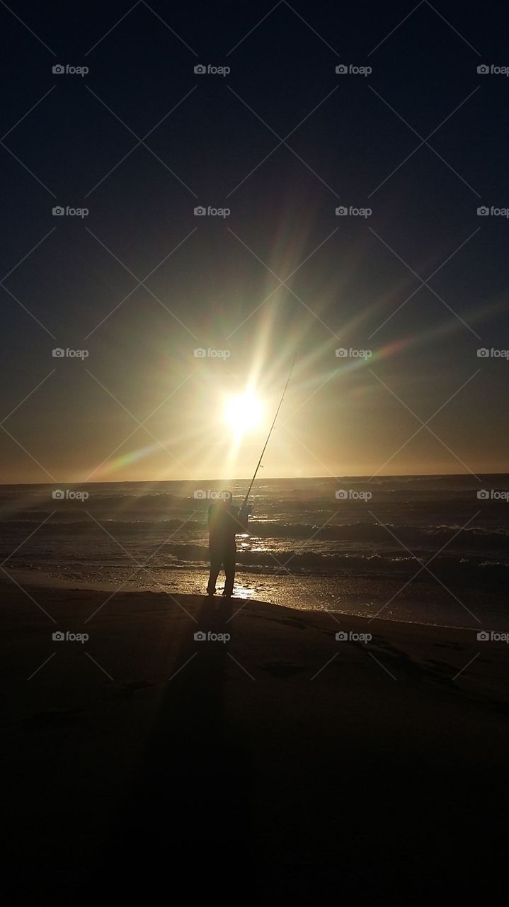 evening fishing on the beach