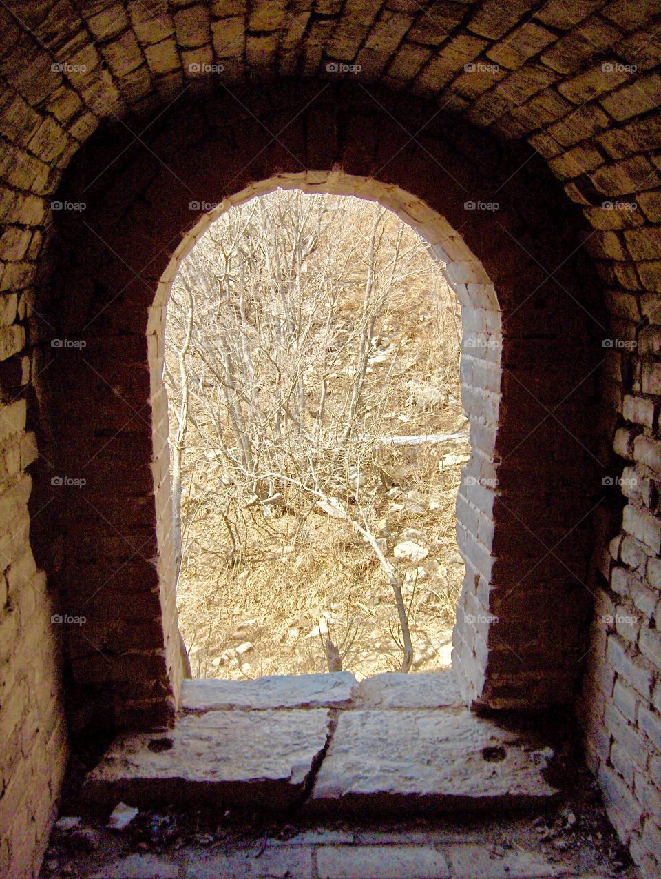 Window of a guard tower in the ruins of The Great Wall