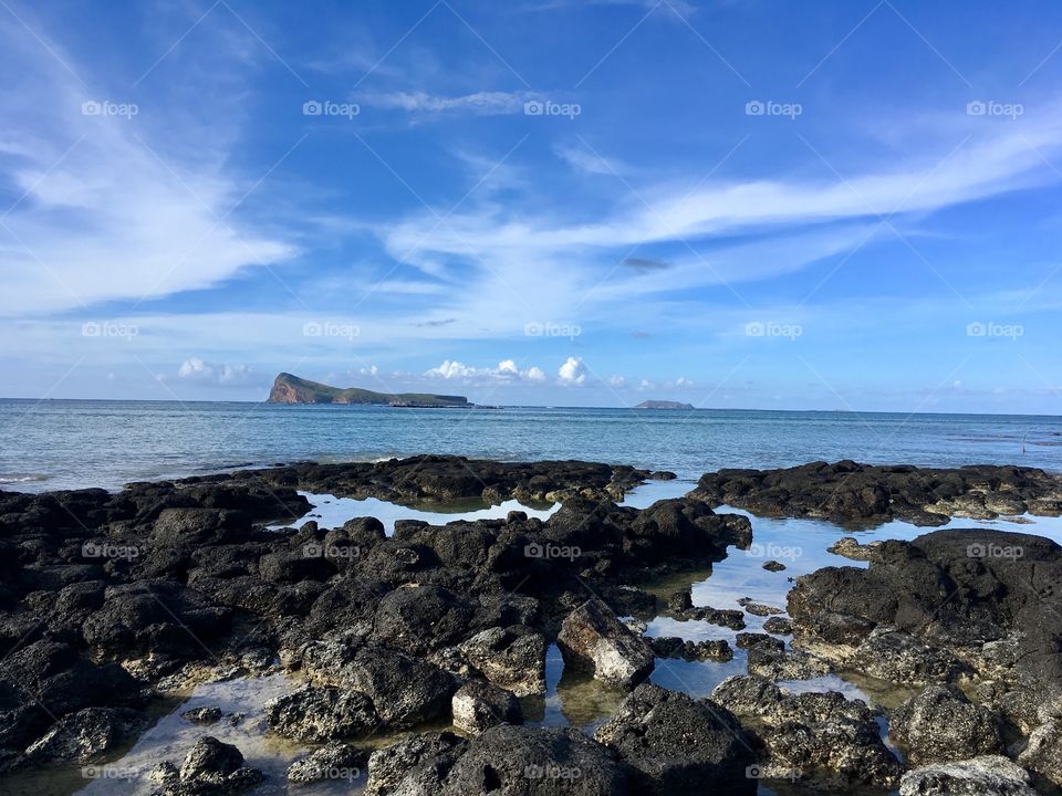 Sunny reflection on a usually stormy cape.