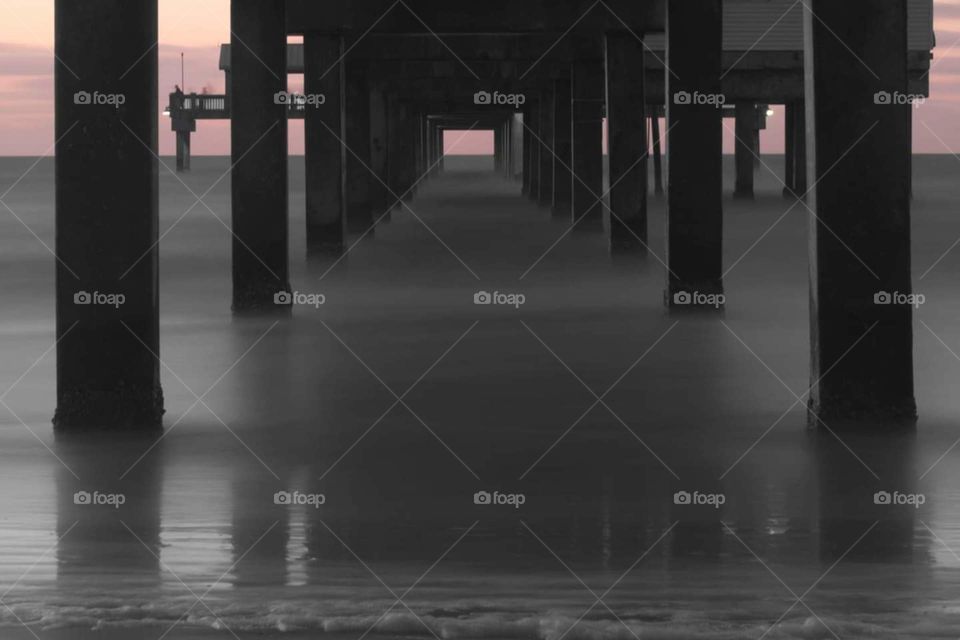 Misty Pier during a storm with cotton candy skies