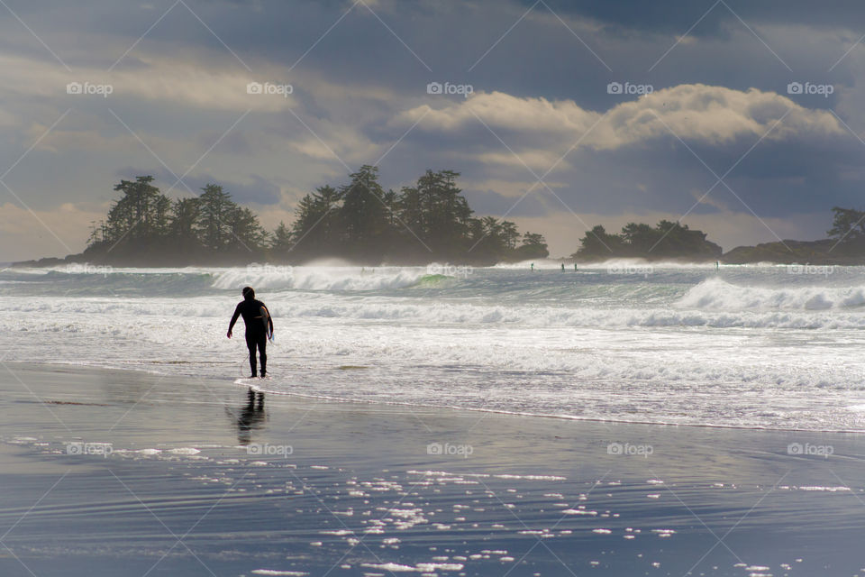 Surfing a Canadian west coast beach in the winter. 