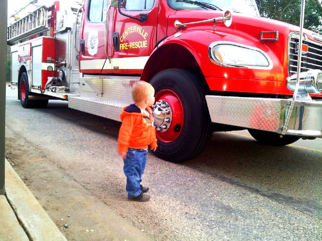 His first fire truck. I took my nephew to a and the firemen were there he was just awe struck  by the truck
