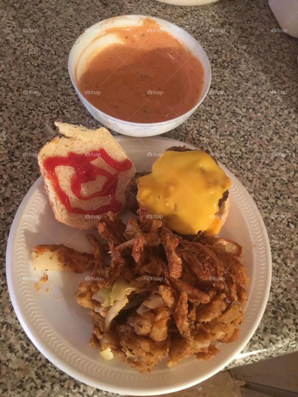 Homemade all by me cheeseburger with Blooming Onion and Sauce 