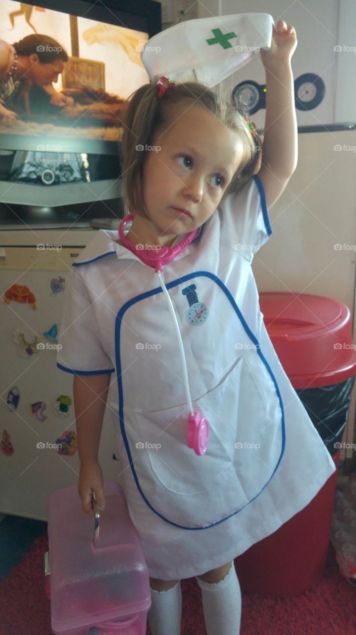 Little boy dressed as a doctor in the hospital