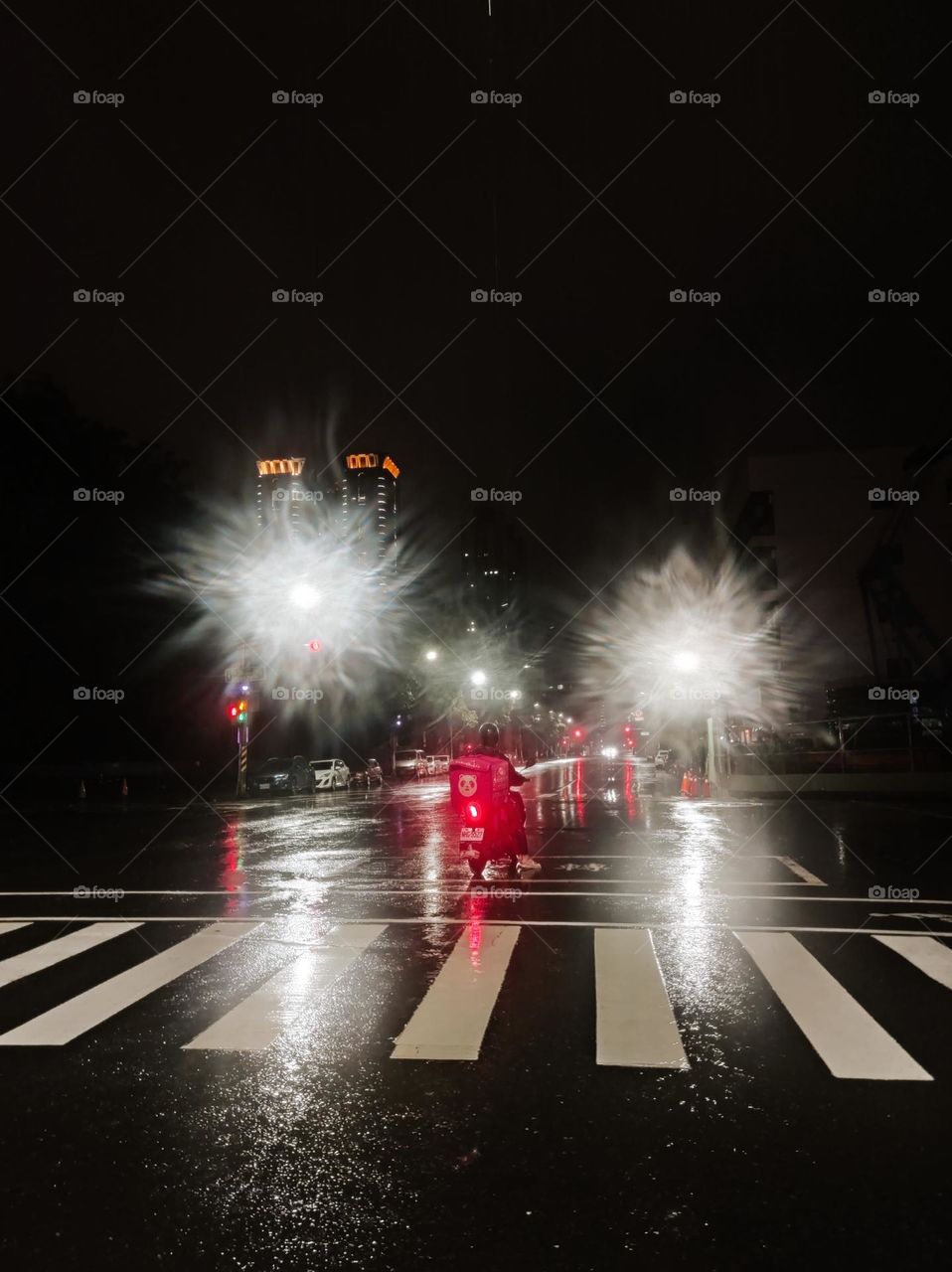 Motorcycle riding in the rain and night