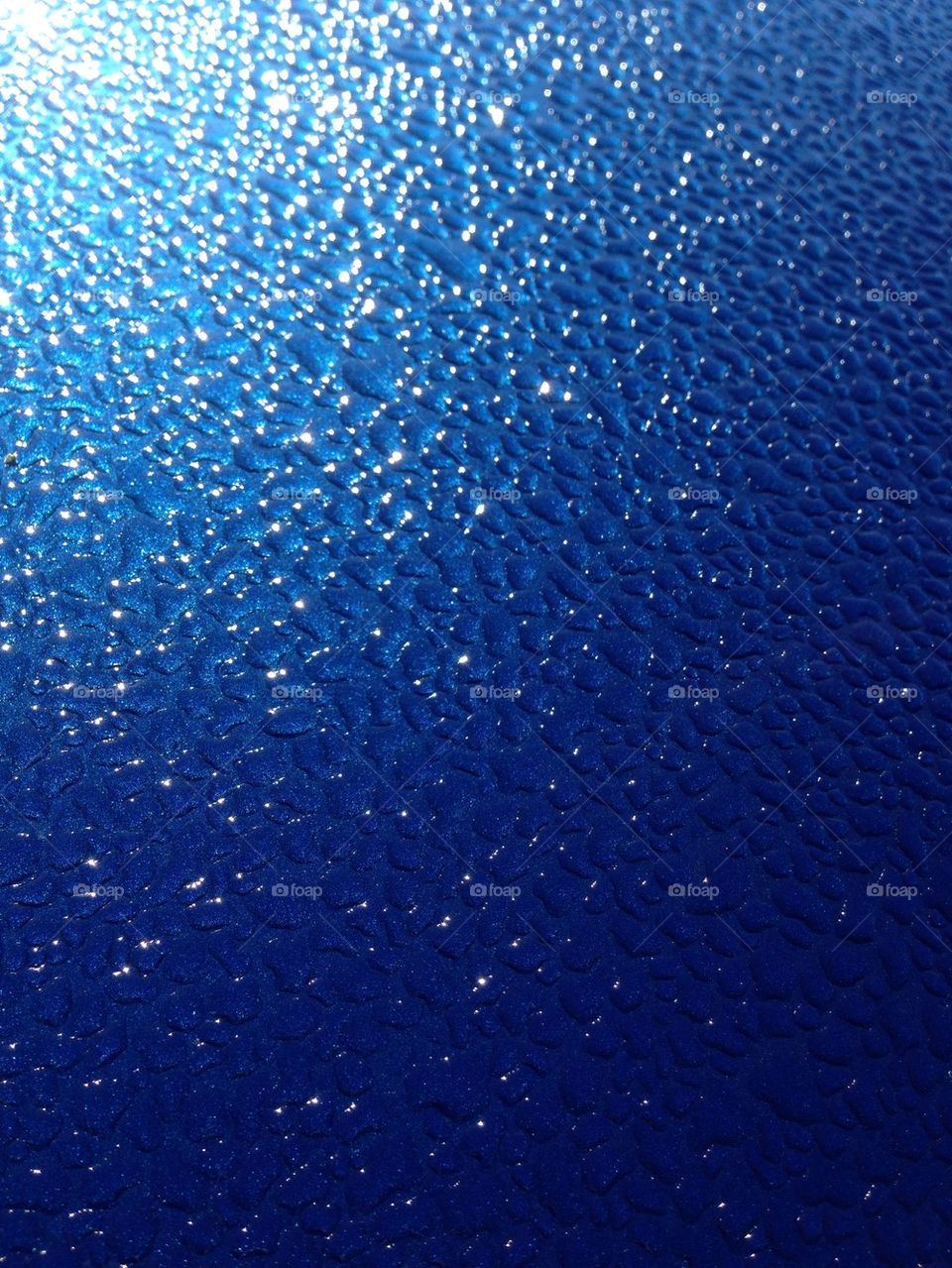 Blue water drops car hood 