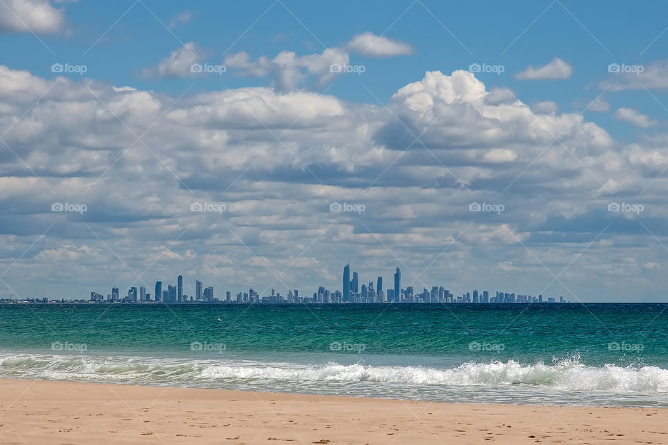 Australia beach with the big city on the background